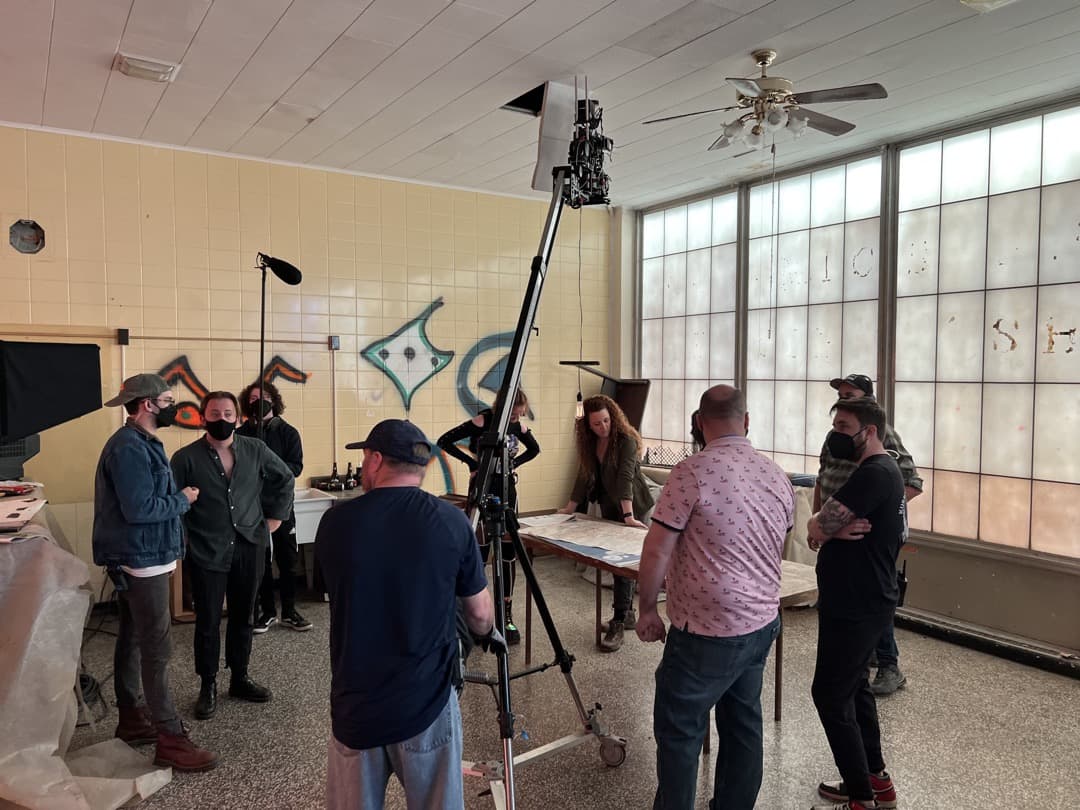 Behind the scenes photo 46 from Clone Cops production showing clone cops cast and crew preparing for a shot with a jib